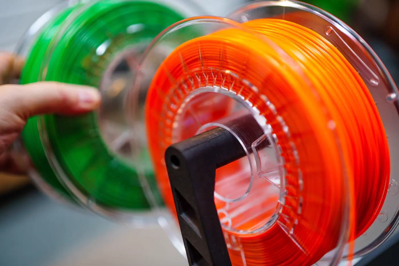 Bobines de filament orange et verte pour imprimante 3D